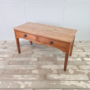 Victorian pine prep table with two side-by-side drawers and a decorative shaped front apron
