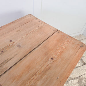 Victorian pine side table with a three plank scrub top and two drawers with matching wooden knobs