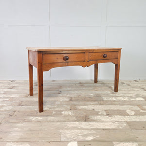 19th century antique pine farmhouse table with shaped apron and two side-by-side drawers
